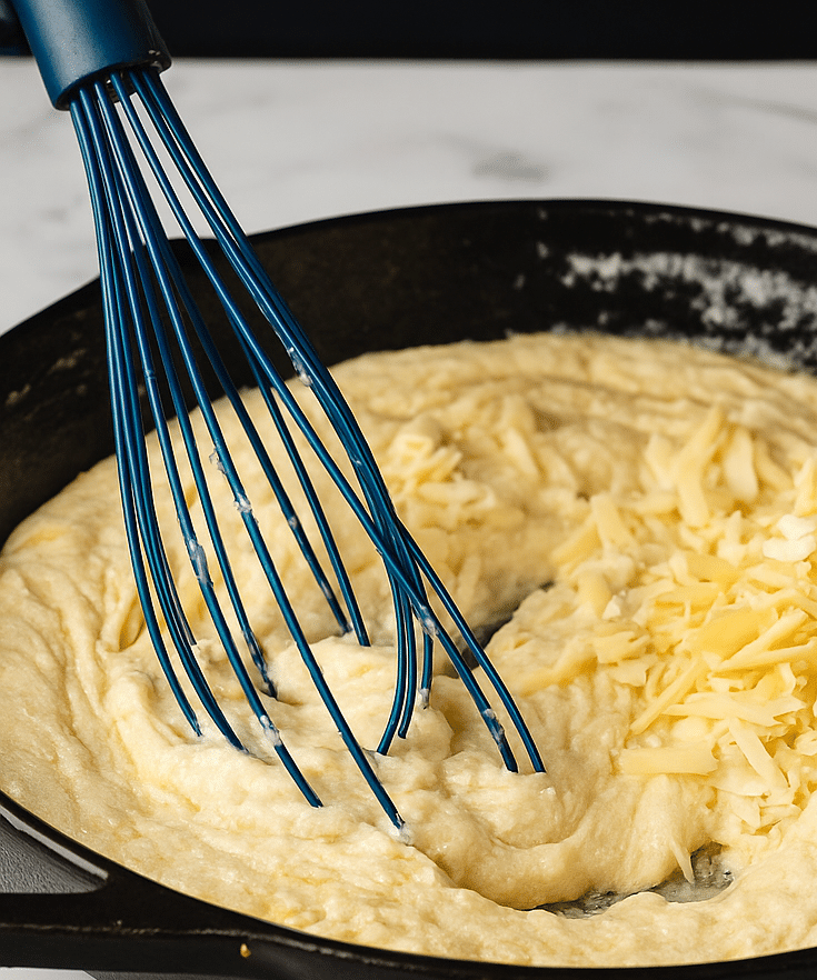Stirring cheese sauce